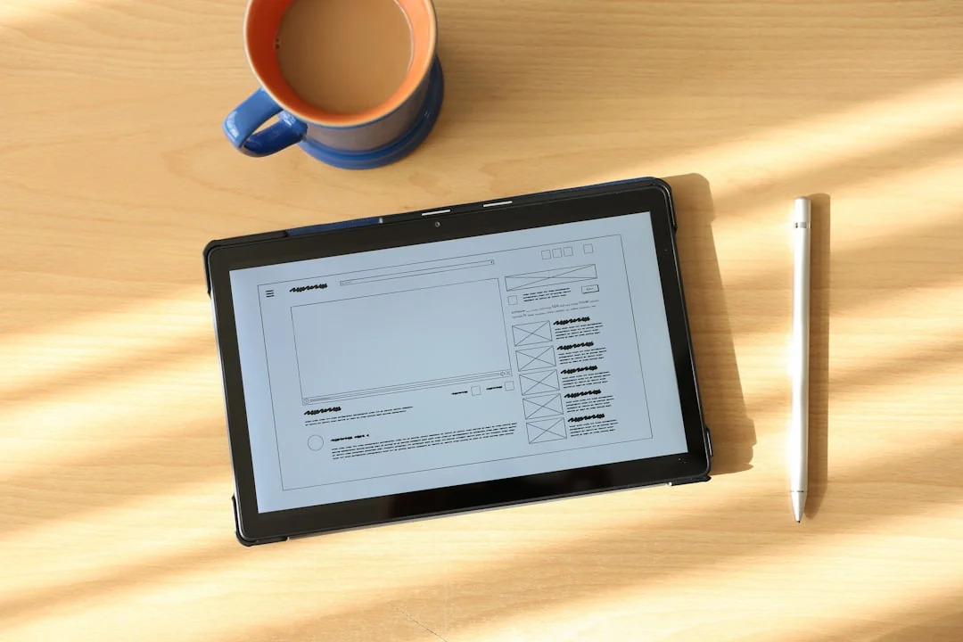A refined office desk arrangement with Apple devices including an iMac, MacBook, and iPad.